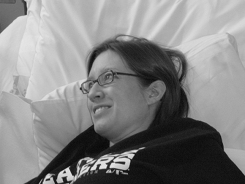 Carolyn smiling despite the contractions