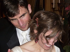 Cutting the cake and looking devilish